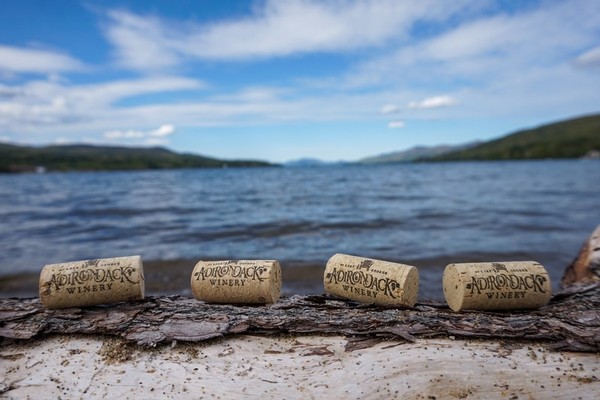 Adirondack Wine corks by a lake