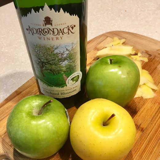 apples and a bottle of wine