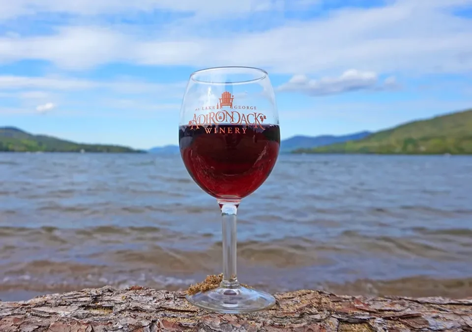 Adirondack Winery wine glasses filled with white, rose and red wine in Lake George