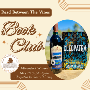 Adirondack Winery's Blue Twilight featured with a book titled Cleopatra by Saara El-arifi for Read Between the Vines Book Club book for May 1st 2026 hosted at Adirondack Winery